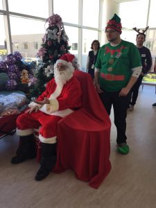 Santa (Jack Corrao) and Elf(Tyler Kiel) supporting ENF at Childrens Hospital during the Holidays